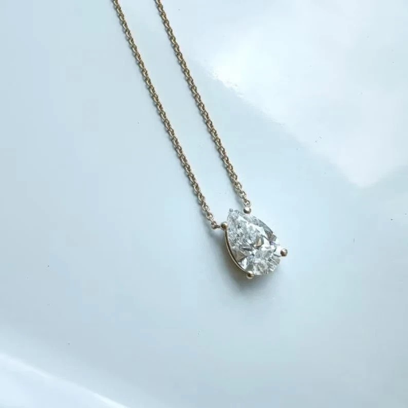2Ct Pear Cut D/VVS1 GRA MOISSANITE 14k White Gold Plated With Free 18In Chain