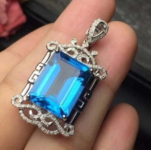 1.30 CT Solitaire Emerald Cut London Blue Topaz Pendant in 14K Gold Finish