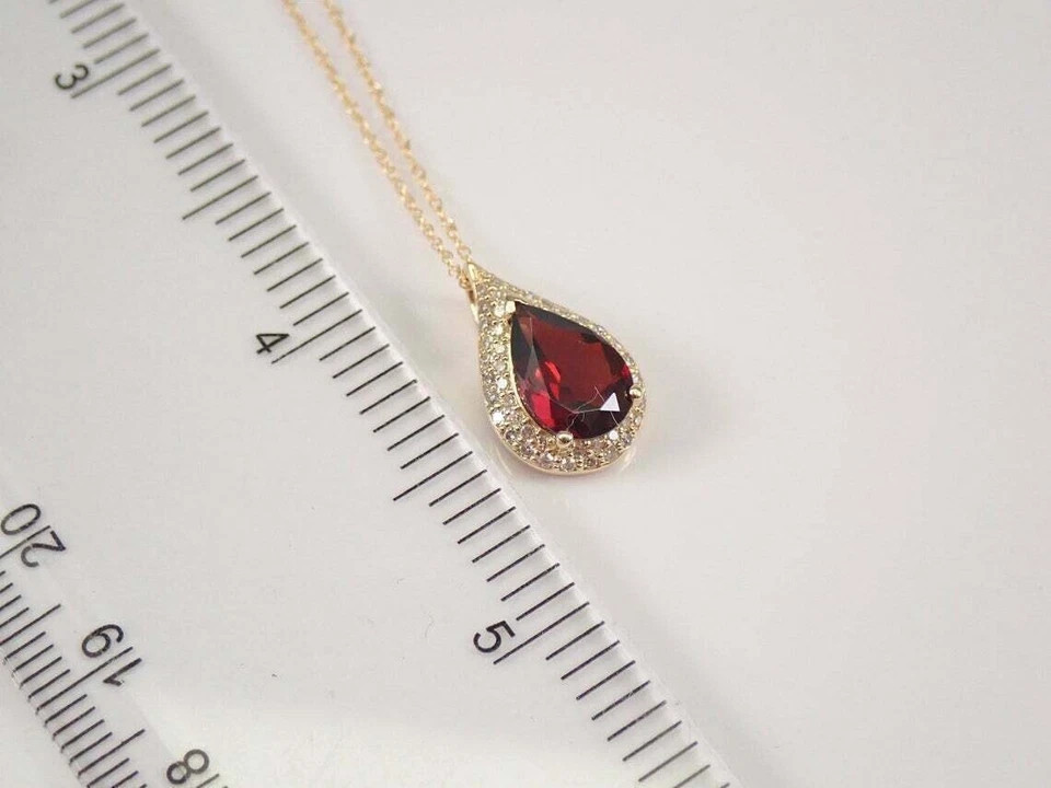 3Ct Pear Cut Red Garnet Halo Pendant 14K Yellow Gold Finish With 18″ Free Chain