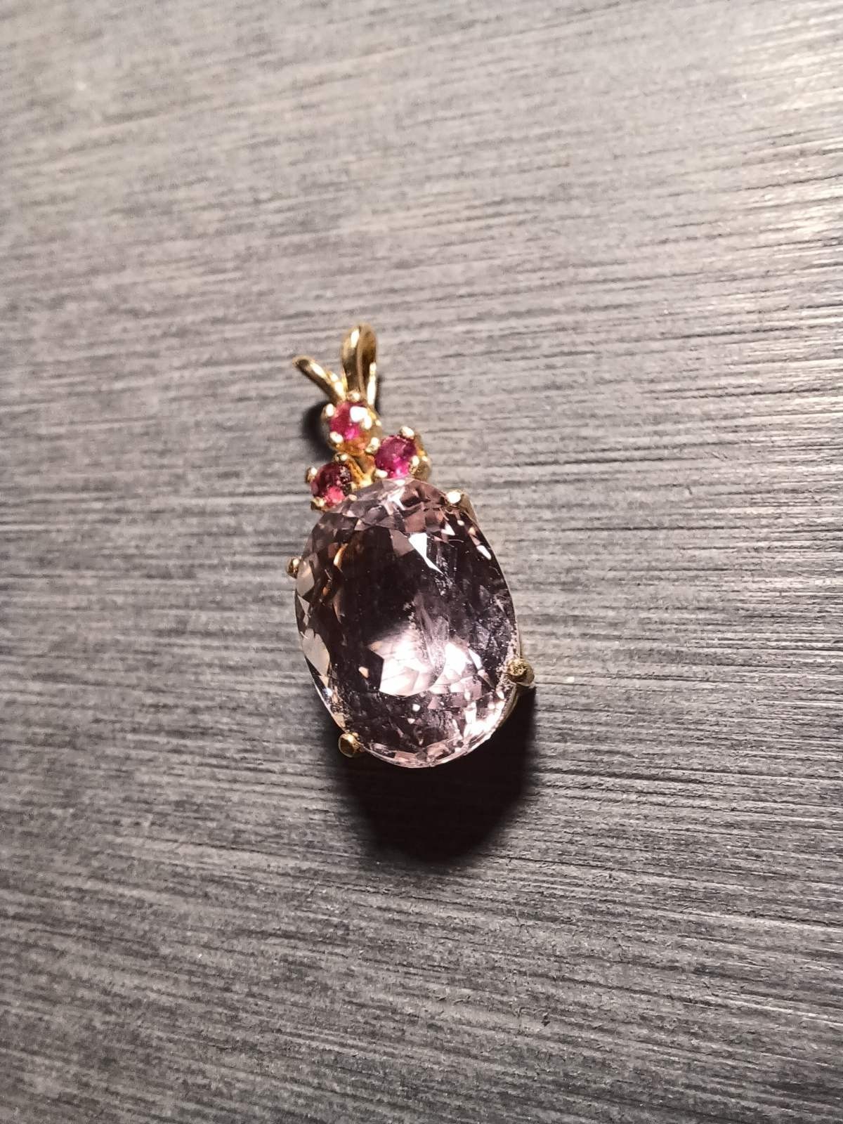 7.96 ct Kunzite in solid 14k gold pendant setting