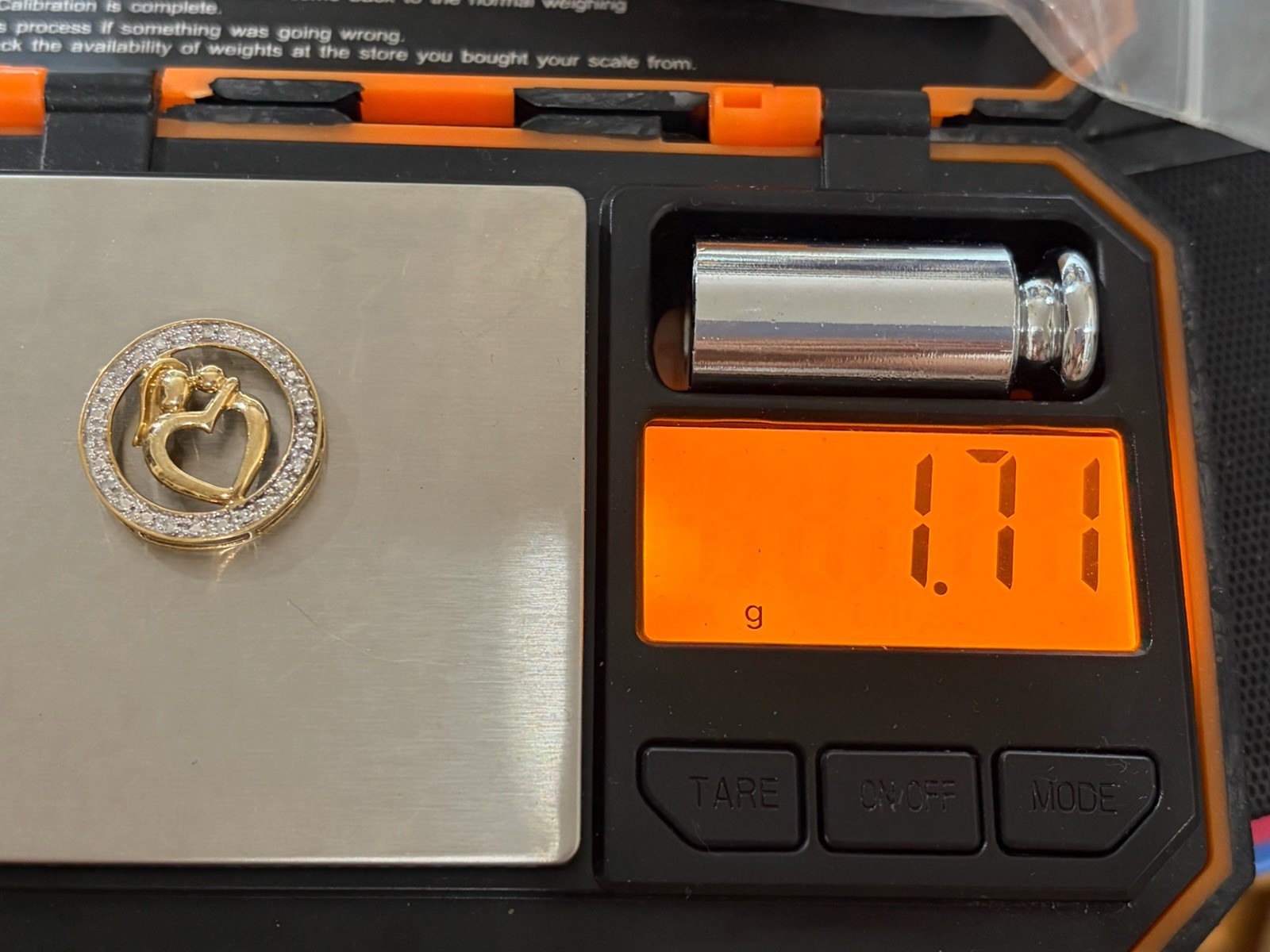 10k Mother And Child Pendant Preowned With 10 Melee Diamonds