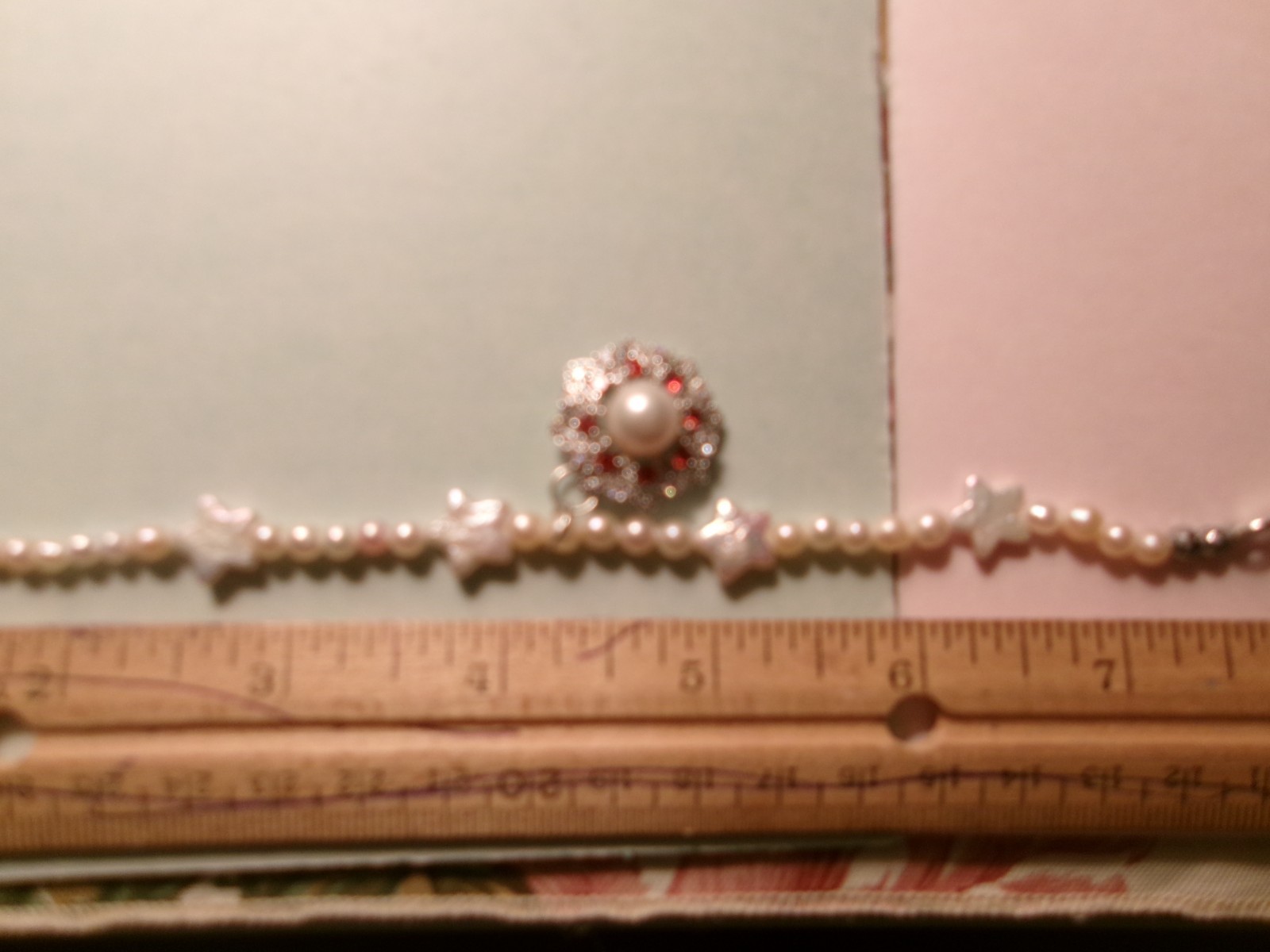 PEARL BRACELET WITH REAL PEARLS I MADE THIS ONE W HITE STARS PINKISH N WHIT