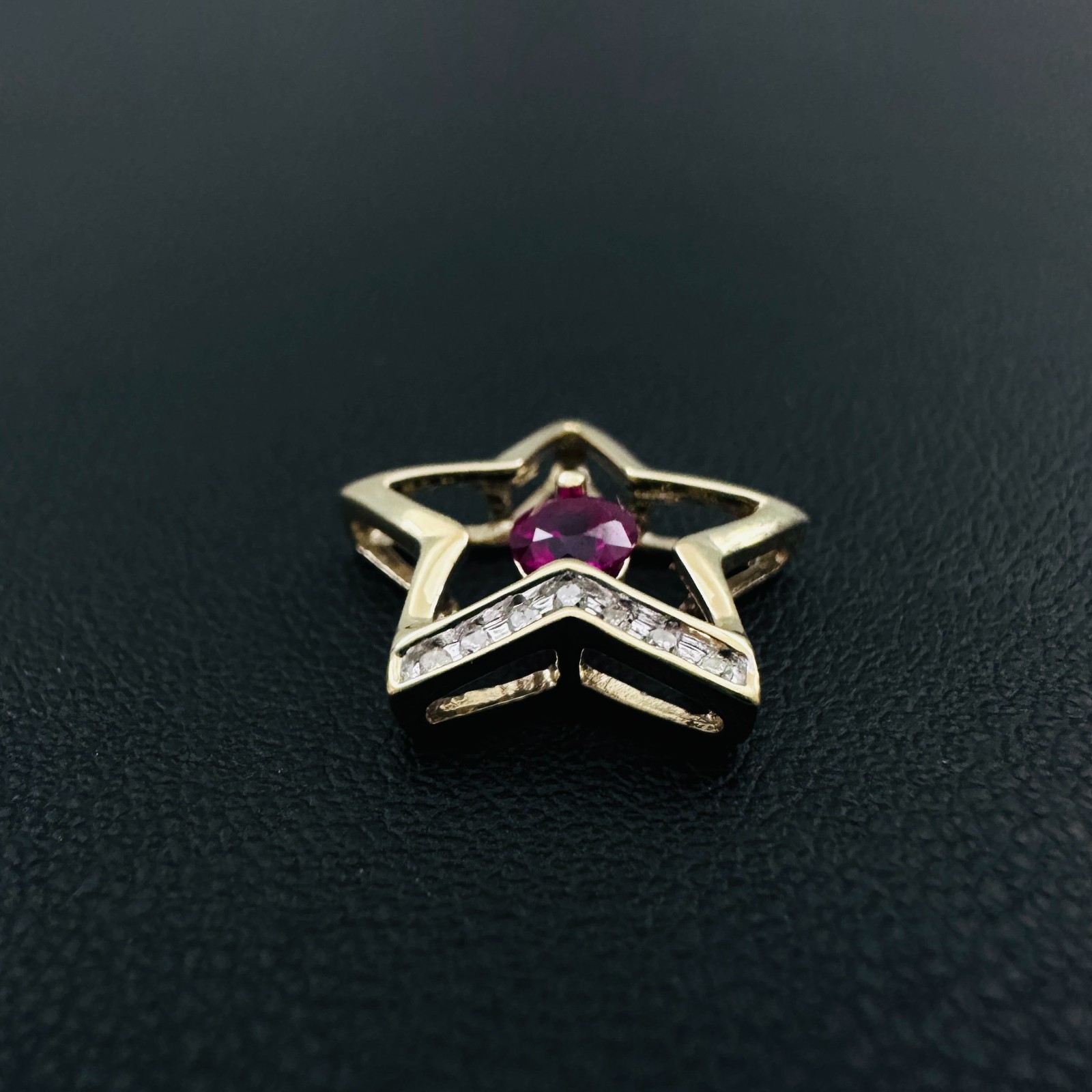 Solid 10K Yellow Gold .25ct Ruby & 7 Diamond Open Star Pendant 16mm, 1.2g