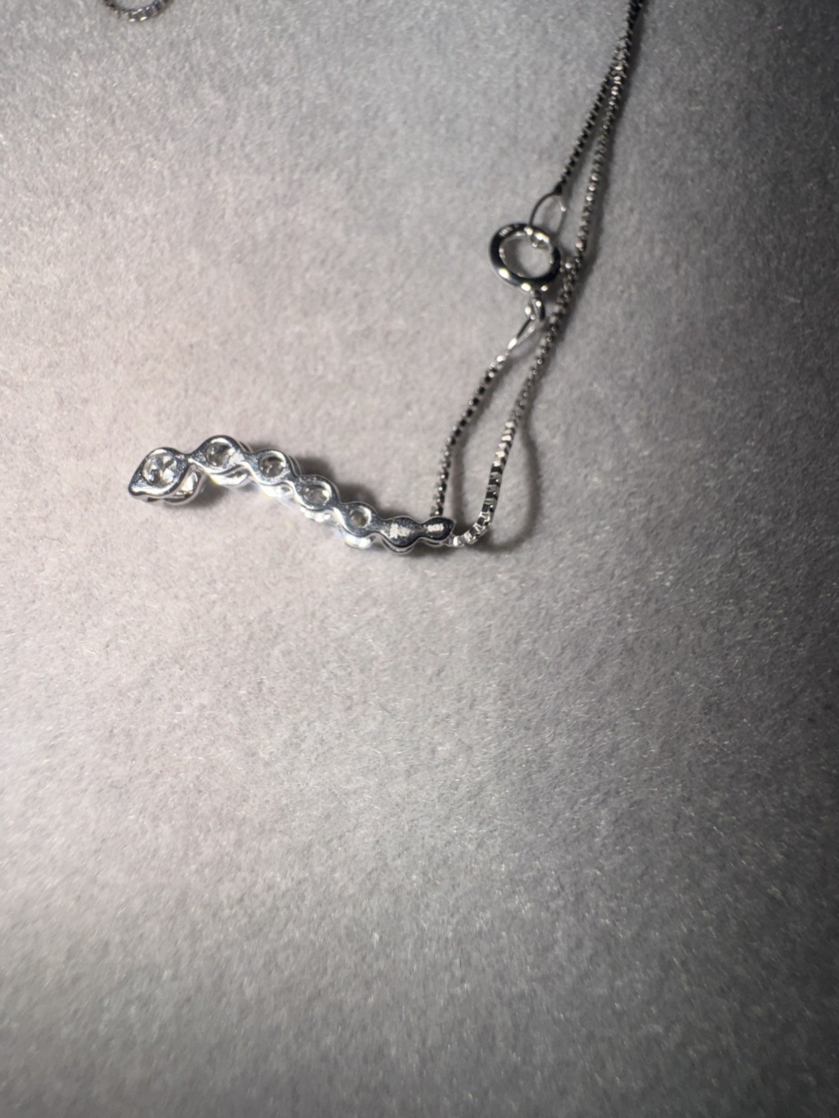 Helzberg Diamonds 10K White Gold 1/4 ct TW Round Diamond Journey Pendant