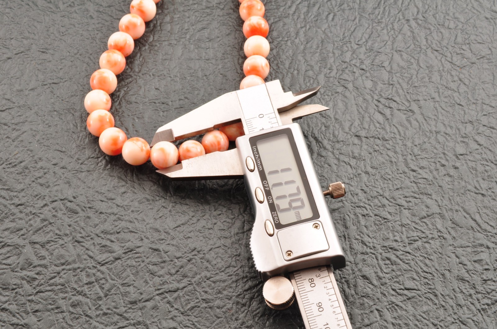 Angel skin coral necklace (17.3in, 423ct) ,925 silver clasp with “Certificate”.