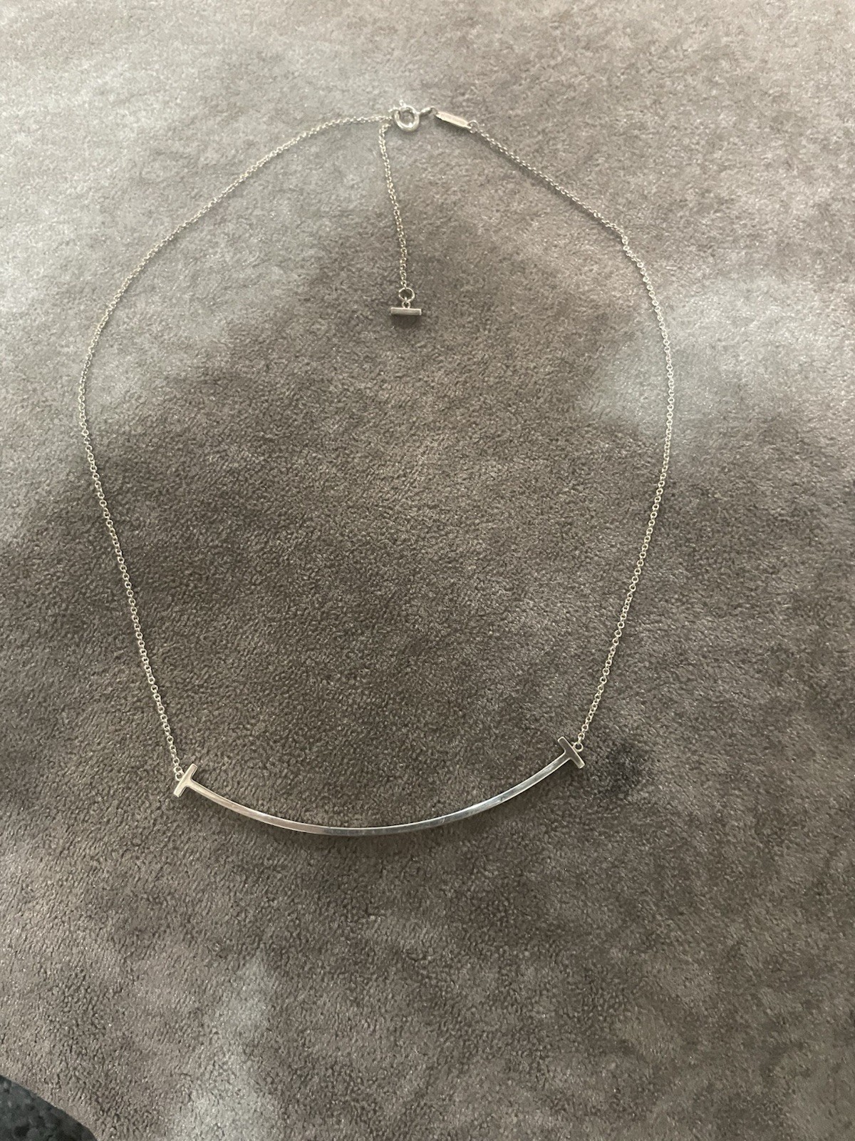 Tiffany & Co. Small T Smile Pendant Necklace Sterling Silver 16–18″