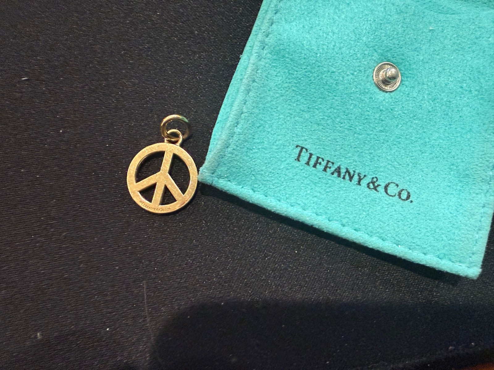Tiffany & Co. Yellow Gold Peace Pendant or Charm