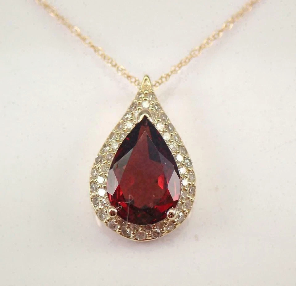3Ct Pear Cut Red Garnet Halo Pendant 14K Yellow Gold Finish With 18″ Free Chain