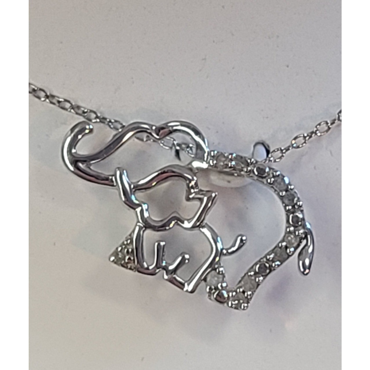 R H Macy & Co Sterling Silver Diamond Elephant Necklace 1 10 CTW