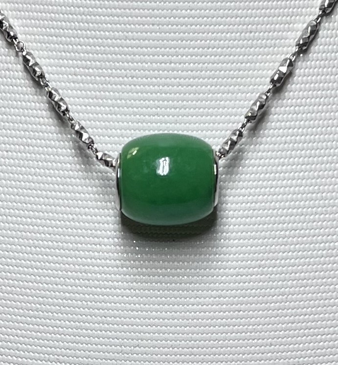 12x13mm drum shaped green jade pendant set in sterling silver