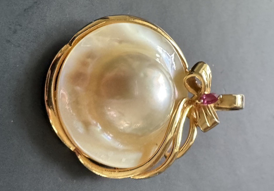 14k YG Blister Pearl, Bow, Ribbon and Ruby Enhancer Pendant 7.25 grams