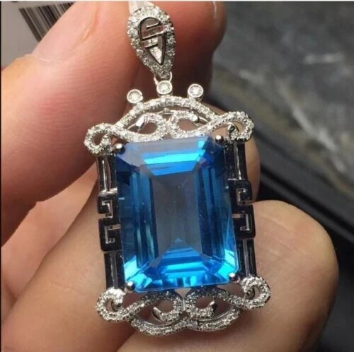 1.30 CT Solitaire Emerald Cut London Blue Topaz Pendant in 14K Gold Finish