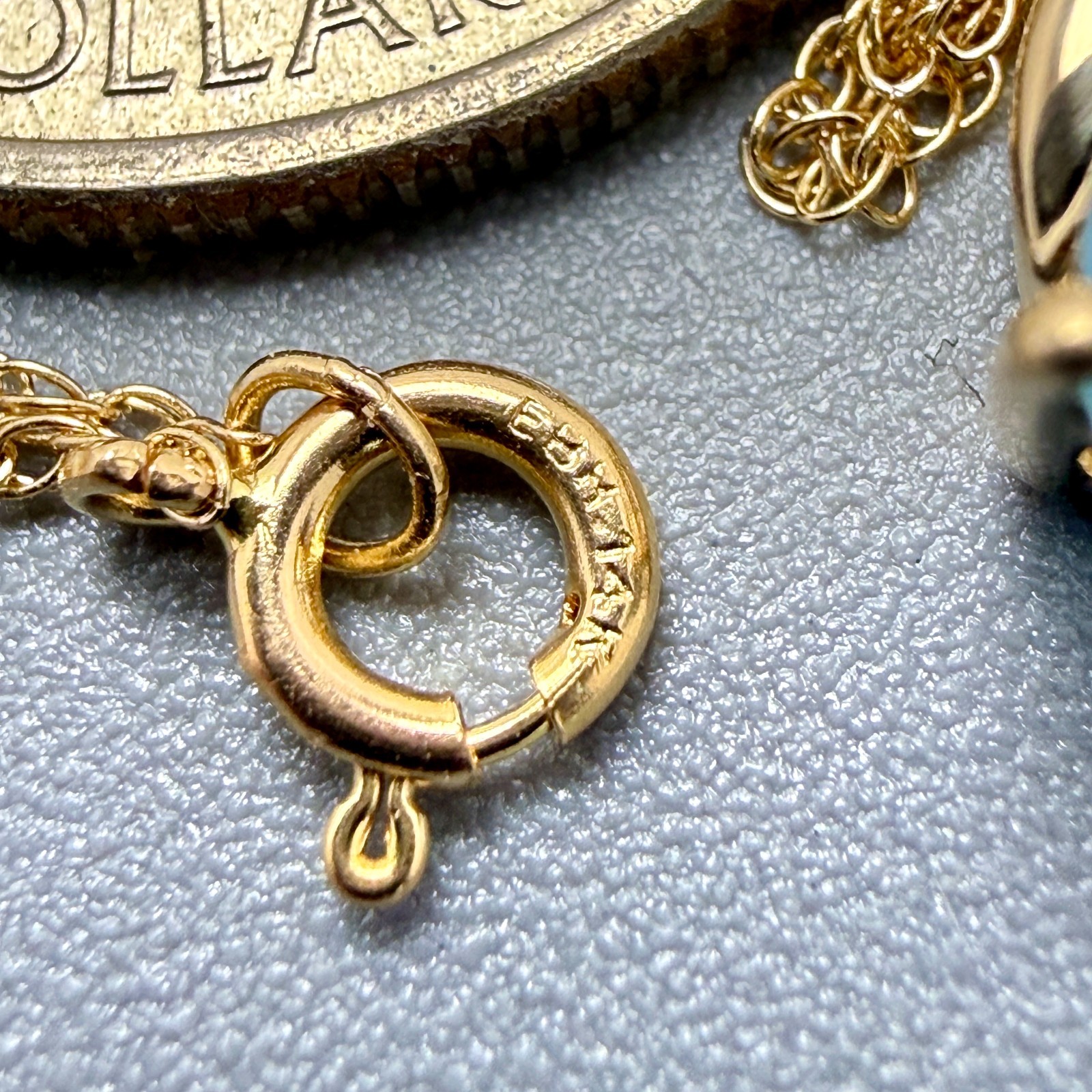 14K Yellow Gold 16″ Necklace with 8x5mm Blue Topaz & Small Diamond 2 grams