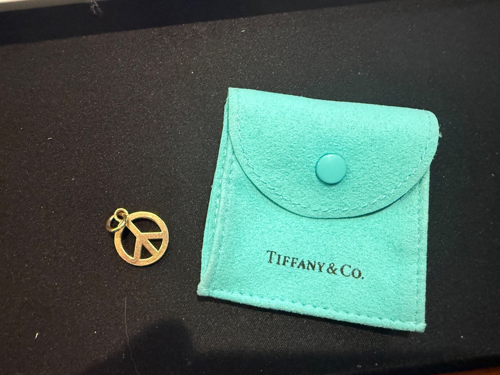 Tiffany & Co. Yellow Gold Peace Pendant or Charm