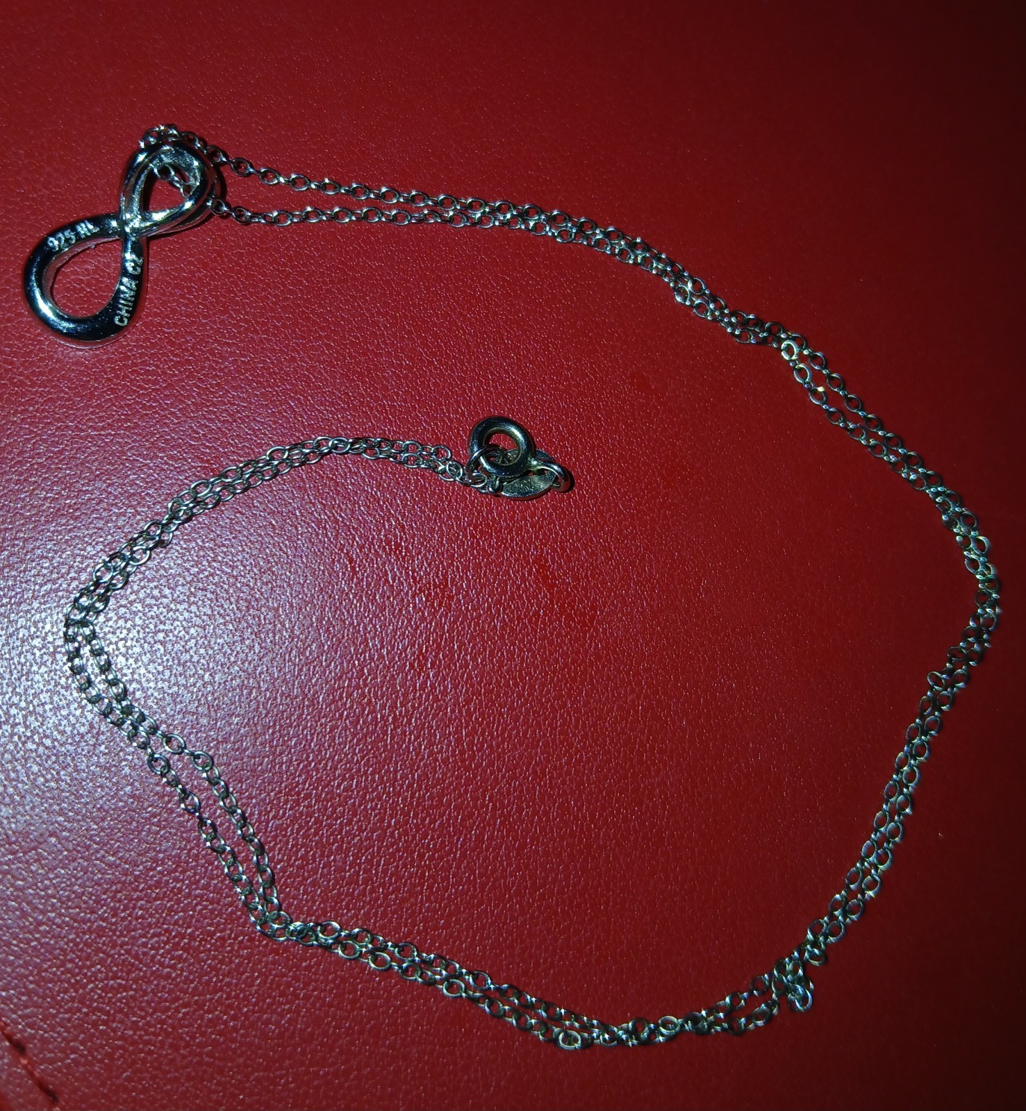 Diamonluxe Infinity Pendant, 18 in. Sterling Silver Chain
