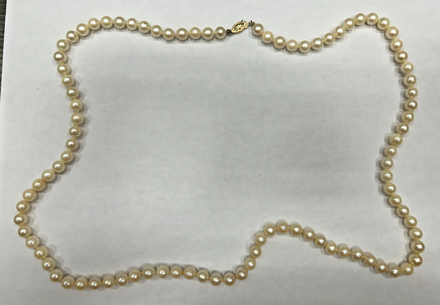 vintage 28 inch Hand Knotted Pearl necklace 14k Yellow Gold Clasp 7MM Pearls