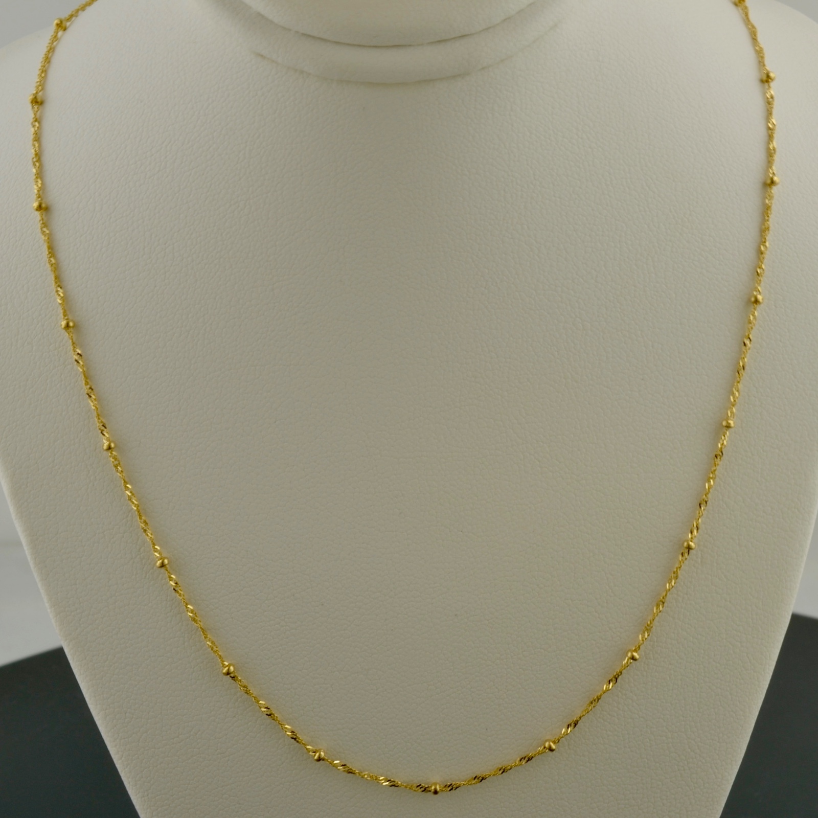 10K YELLOW GOLD 1.0MM SINGAPORE SATURN CHAIN W/1.9MM BEAD STATIONS