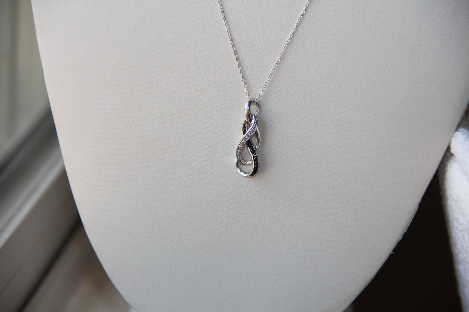 Sterling Silver Black and White Diamonds Infinity Pendant Necklace
