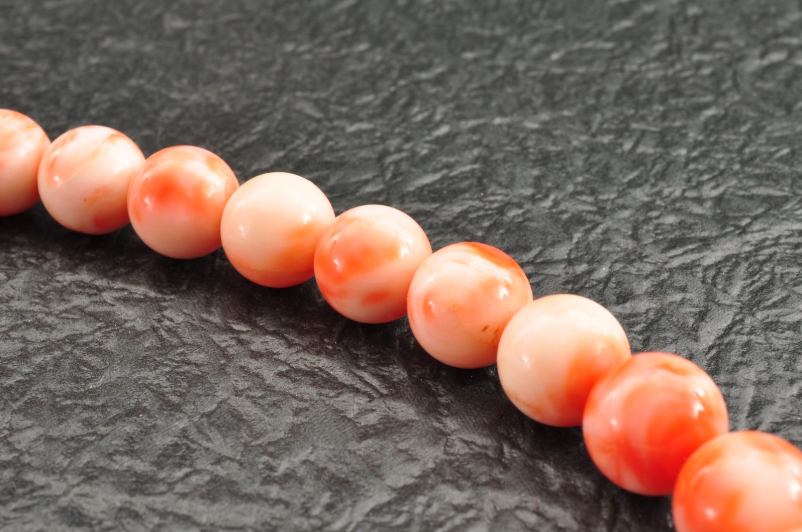 Angel skin coral necklace (17.3in, 423ct) ,925 silver clasp with “Certificate”.