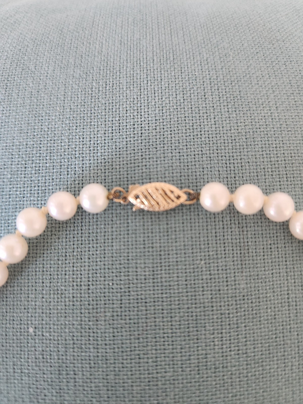 saltwater pearl 16 inch necklace. Beautiful individually tied 7 mm pearls. 14 c
