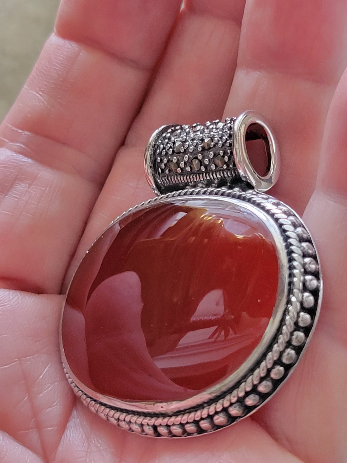 FINE CARNELIAN OVAL PENDANT, STERLING/ LARGE ROUND MARCASITE BALE