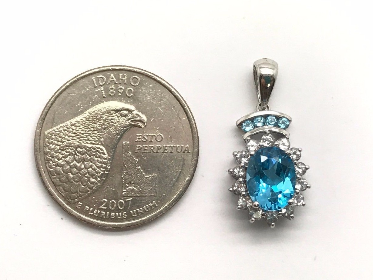 Sterling Silver 925 Oval Swiss Blue Topaz Pave – CZ Burst Flower Halo Pendant
