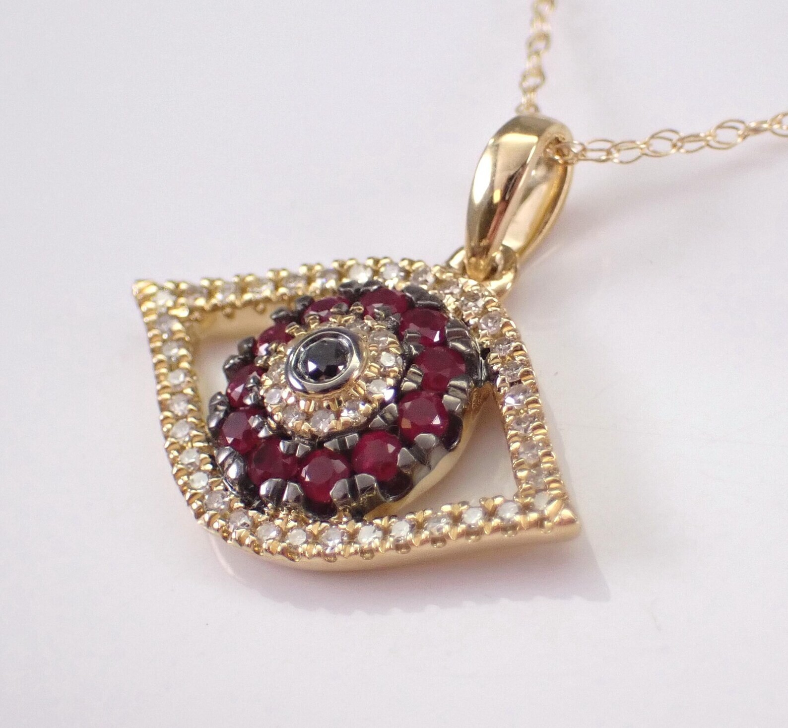 0.40Ct Round Cut Lab-Created Red Ruby Evil Eye Pendant 14K Yellow Gold Plated
