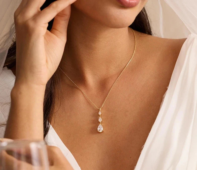 2TCW Pear Cut lab Created Diamond 3-Stone Pendant 14k Yellow Gold plated