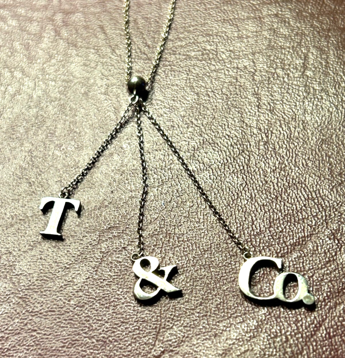 Tiffany & Co Sterling Silver T&CO Letters Lariat Necklace-excellent – no box.