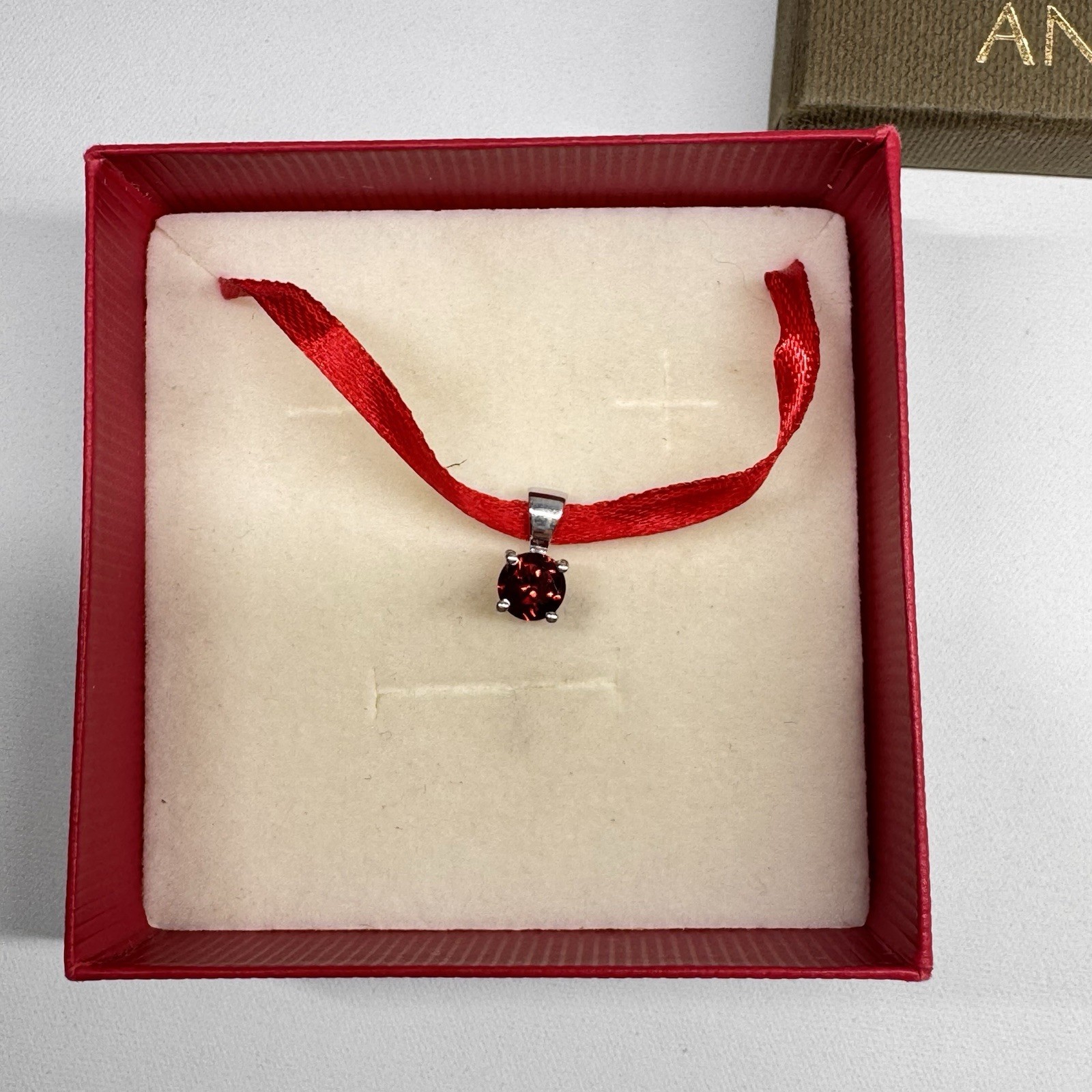 ANGARA 925 Sterling Silver Round Red Garnet Prong Pendant on Red Ribbon