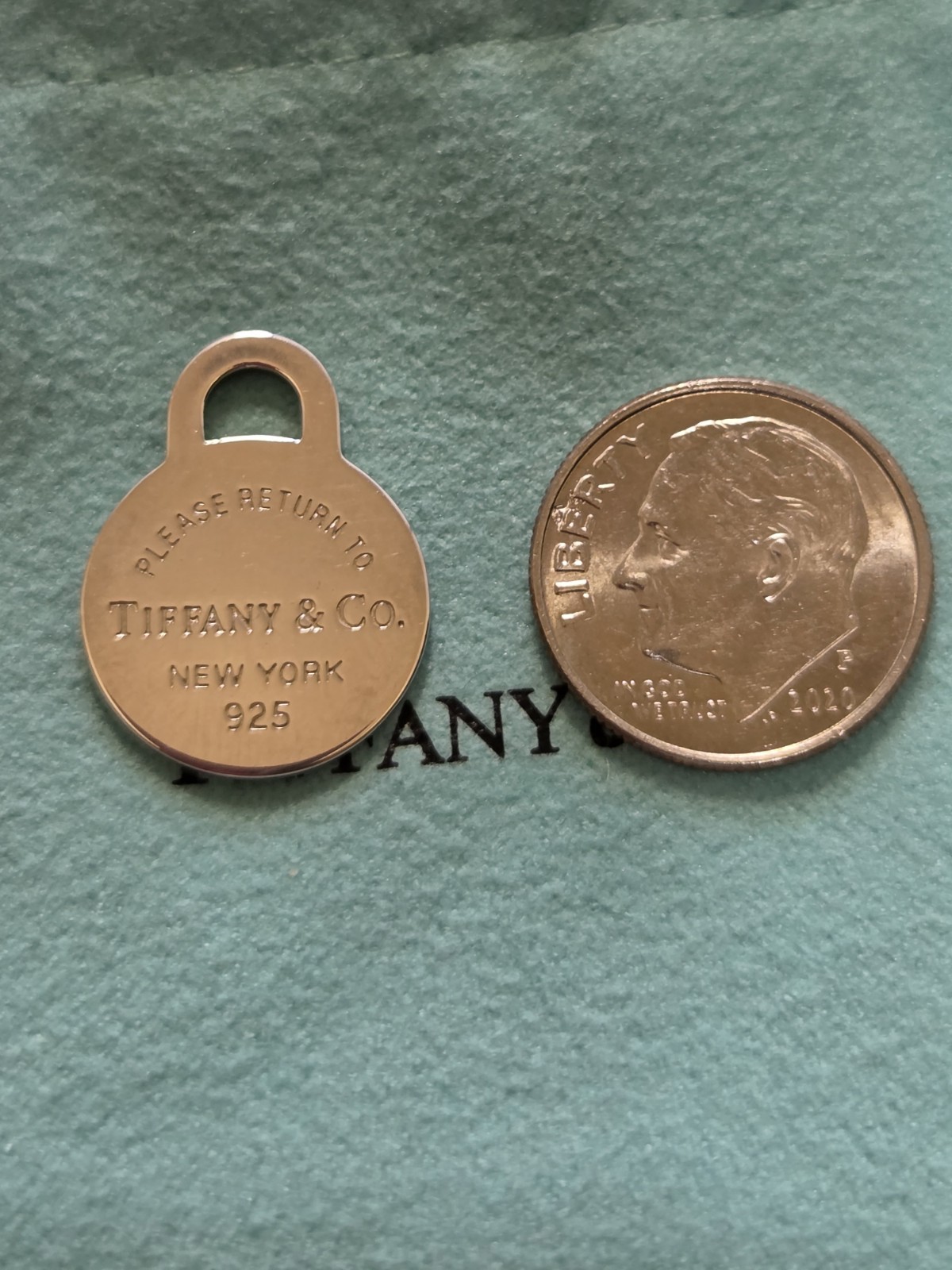 Tiffany & Co. Return to Tiffany 925 Sterling Silver Round Tag Charm Pendant