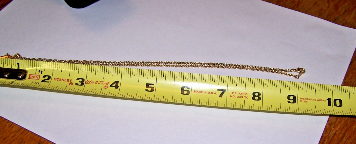 Necklace with Pendant marked Genuine Amethyst. Chain marked “Korea” in case
