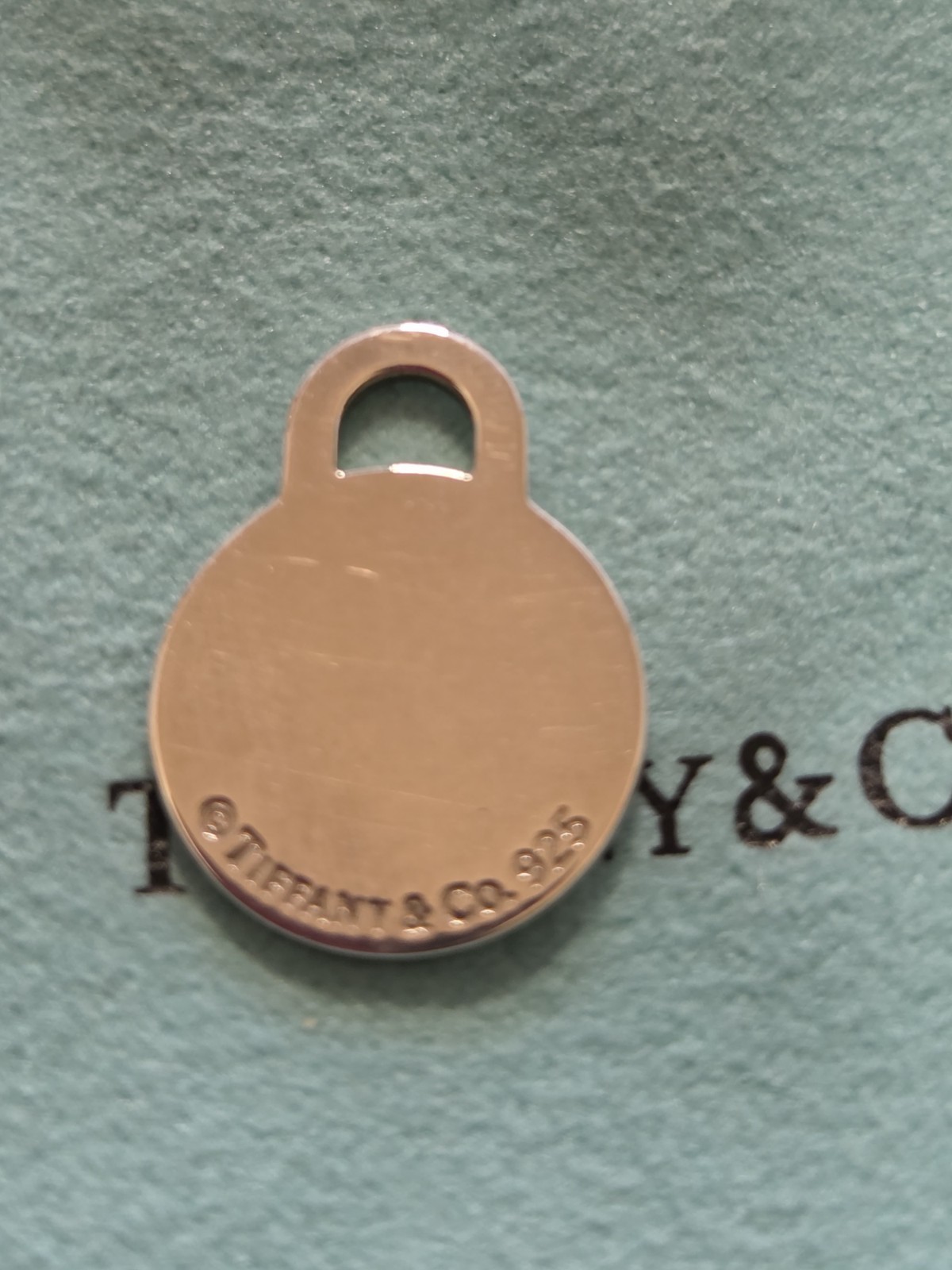 Tiffany & Co. Return to Tiffany 925 Sterling Silver Round Tag Charm Pendant