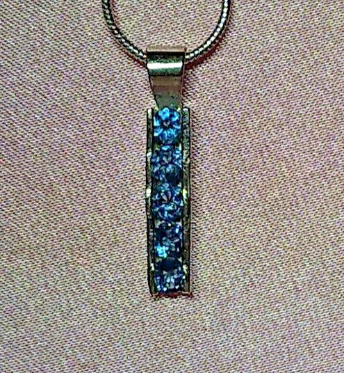 5 STONE LONDON BLUE TOPAZ 4mm PENDANT- .925 STERLING SILVER 1.50ctw
