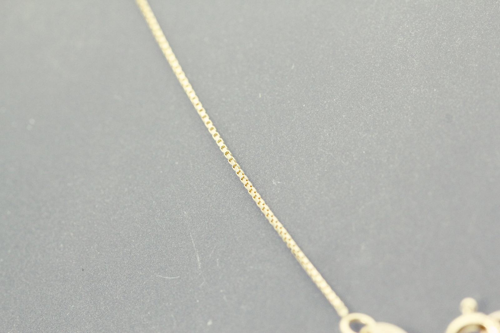 10K Yellow Gold Double Ring Pendant On 18″ Thin Box Chain 1.4 Grams (NEC5060)
