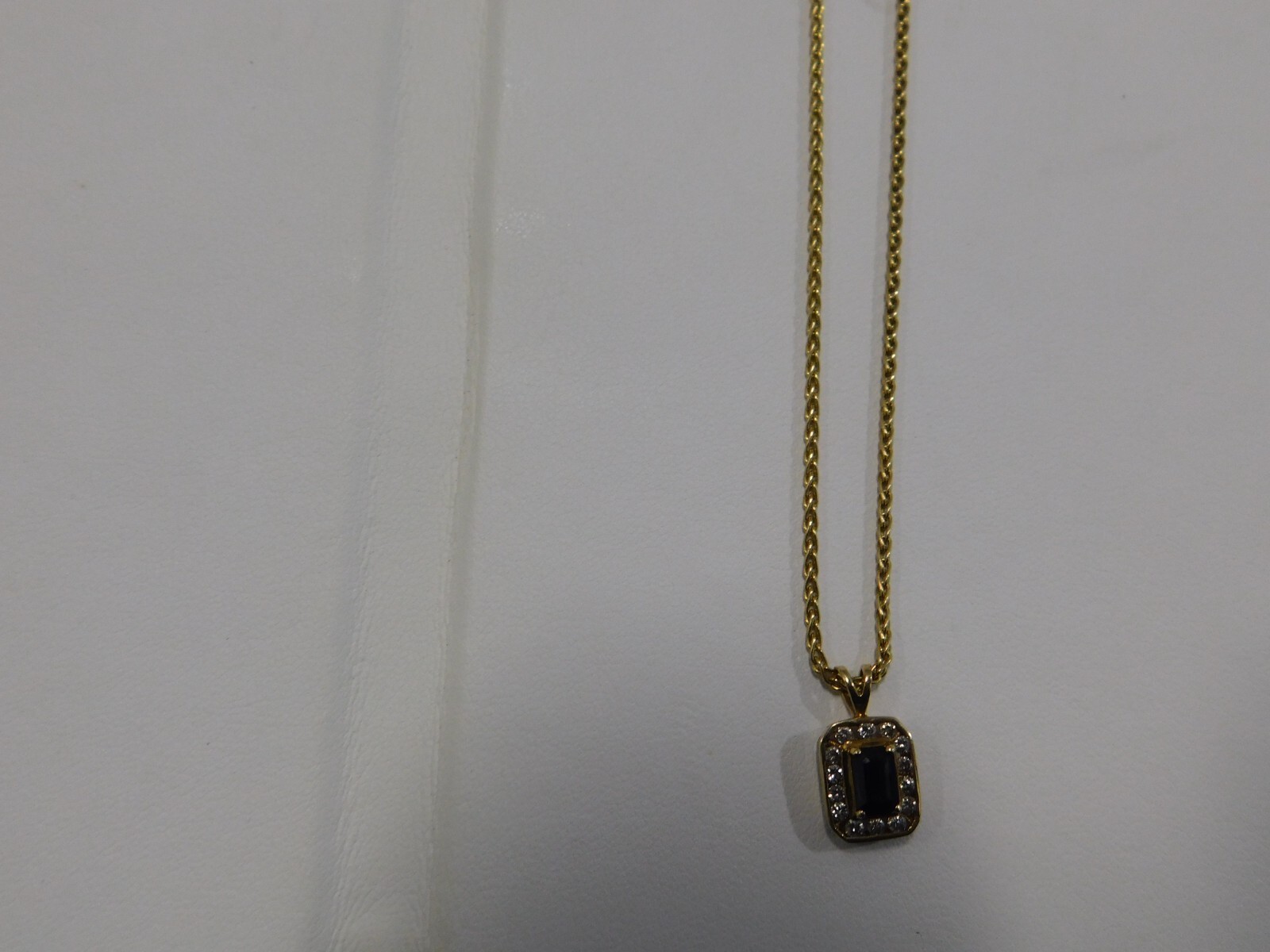 14k yellow gold sapphire and diamond pendant on 18″ 1 1/2 mm round chain