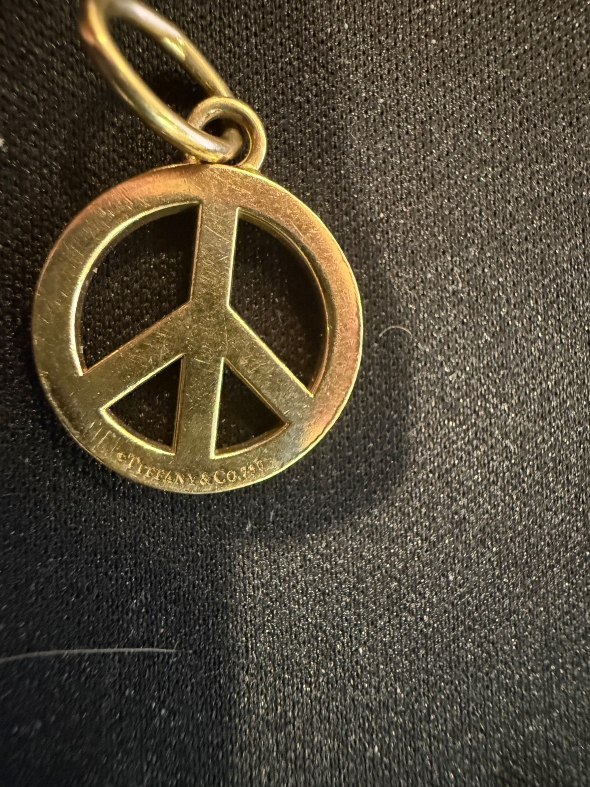 Tiffany & Co. Yellow Gold Peace Pendant or Charm