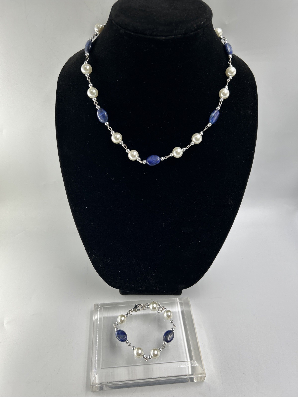 beautiful Fashion necklace with faux pearl and blue stones And Bracelet