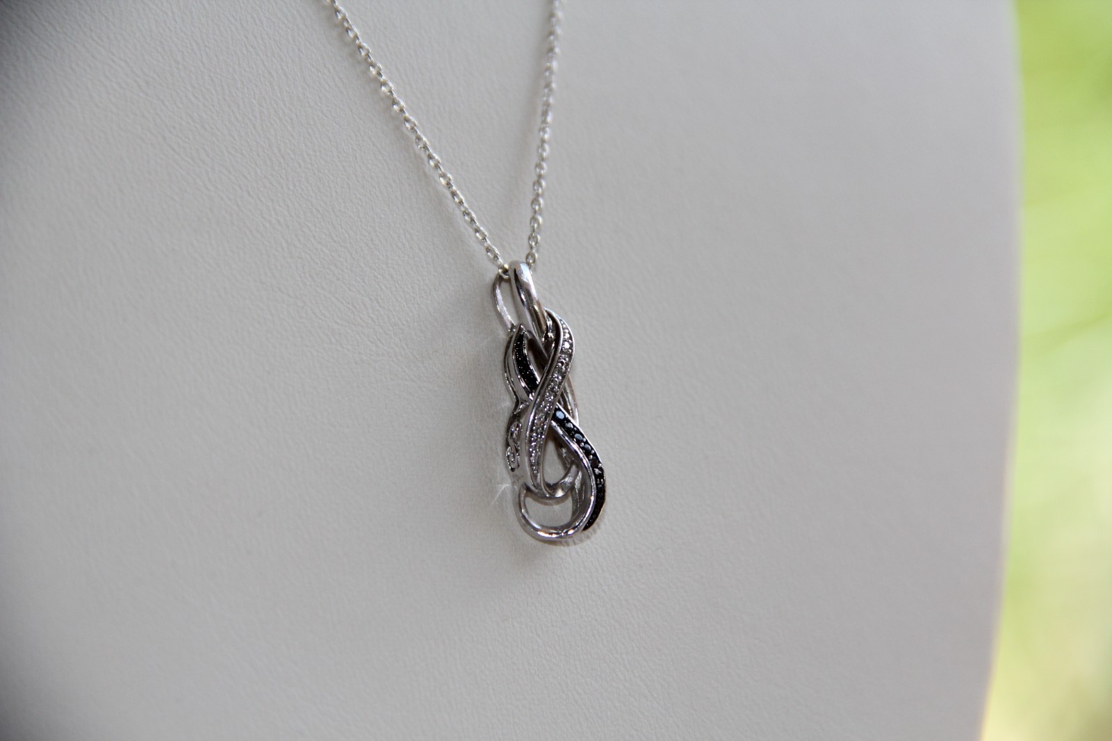 Sterling Silver Black and White Diamonds Infinity Pendant Necklace