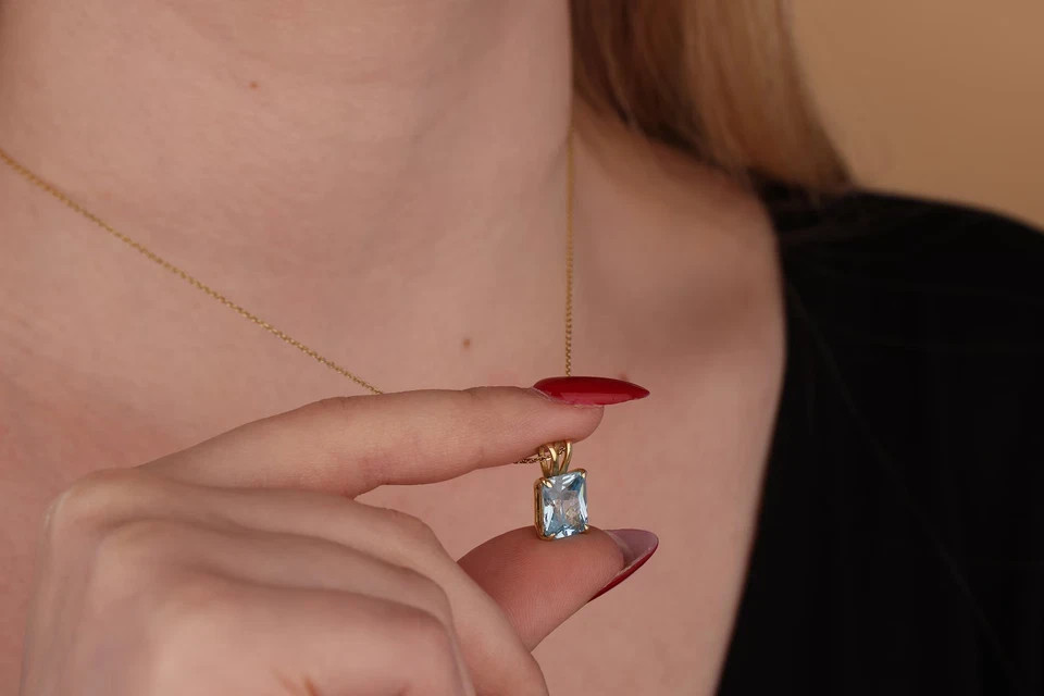 2 Ct Emerald Cut Lab Created Blue Topaz Women’s Pendant 14K Yellow Gold Plated