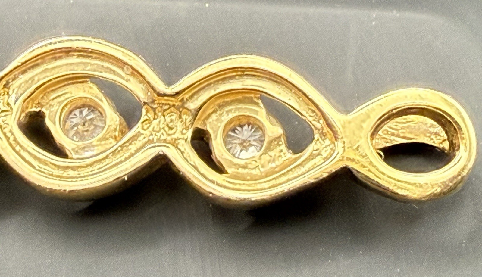 10K Yellow Gold Triple Infinity Pendant/charm featuring 3 genuine diamonds 1.4g