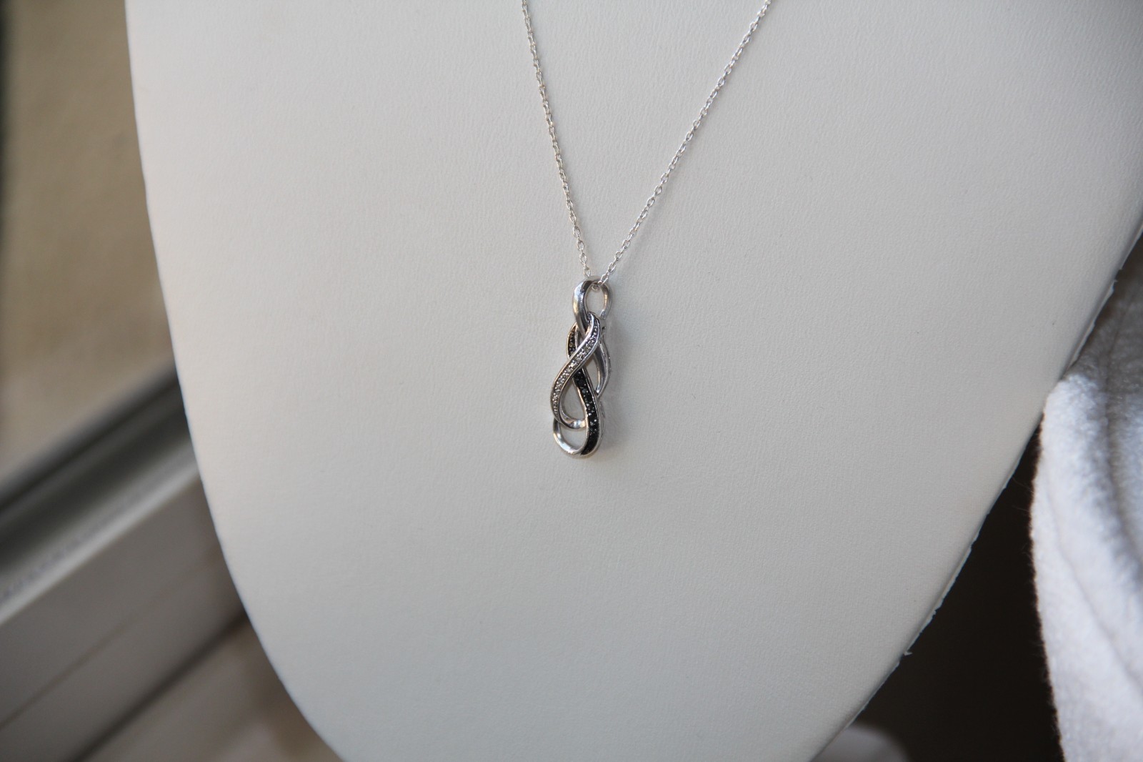 Sterling Silver Black and White Diamonds Infinity Pendant Necklace