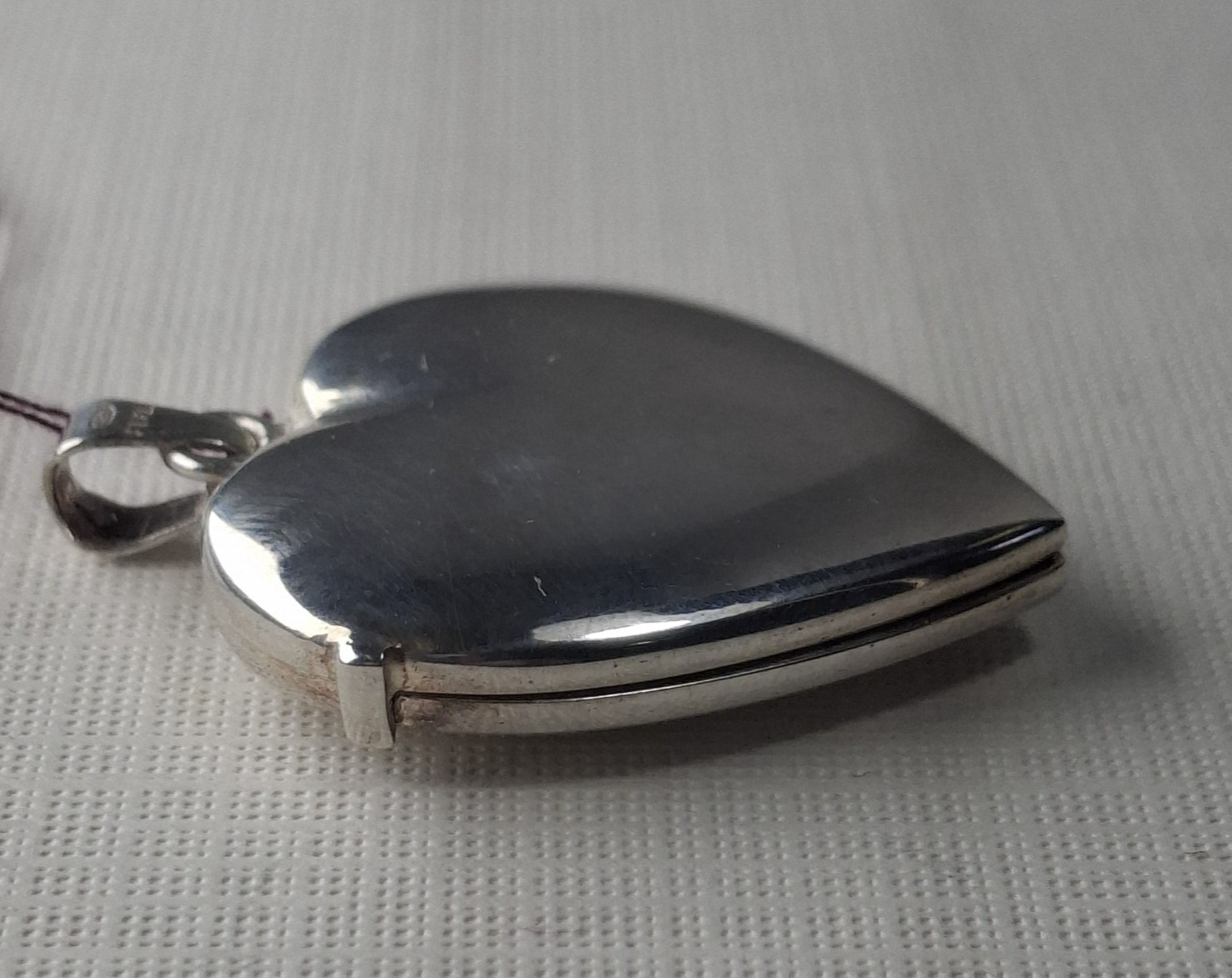 Sterling Silver Heart-Shaped Locket holds 2 photos 1 1/4″ x 1″ Made In Italy
