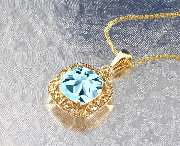 925 Yellow Gold Plated Silver Cushion Cut Sky Blue Topaz and Moissanite Pendant