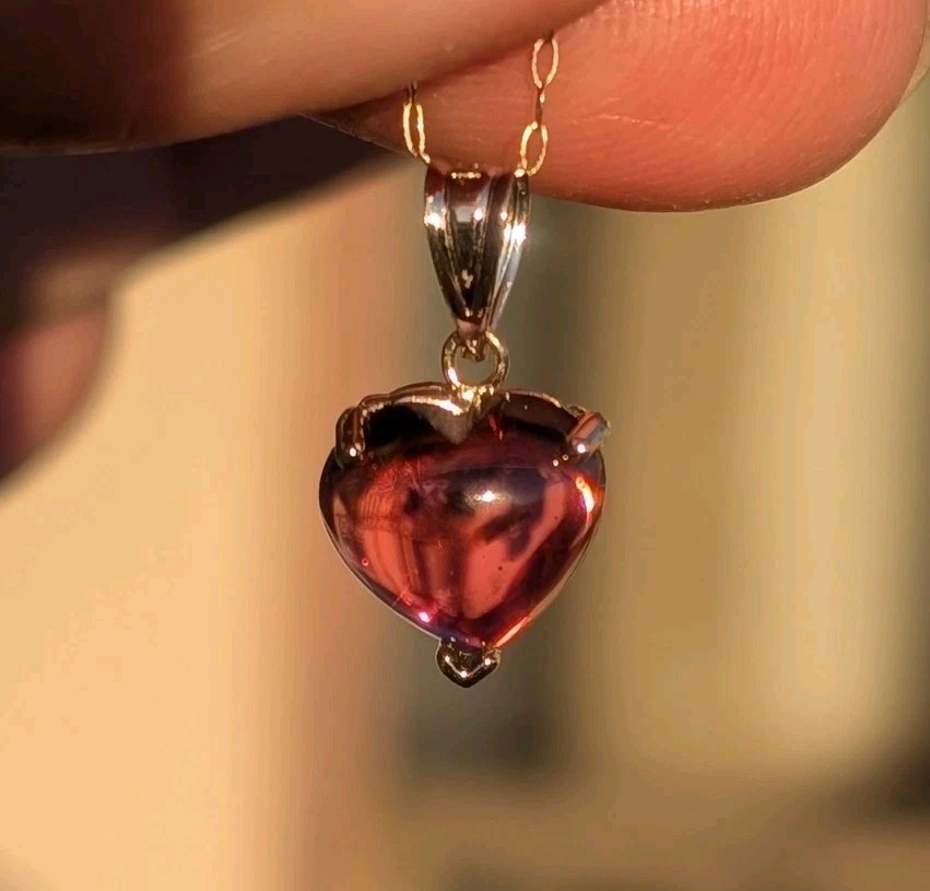 14 k Yellow gold and 4.5 ct cabochon tourmaline heart pendant