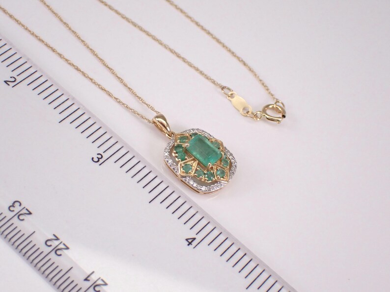 2.2Ct Emerald Cut Lab Created Emerald Halo Pendant 14K Yellow Gold Plated Silver
