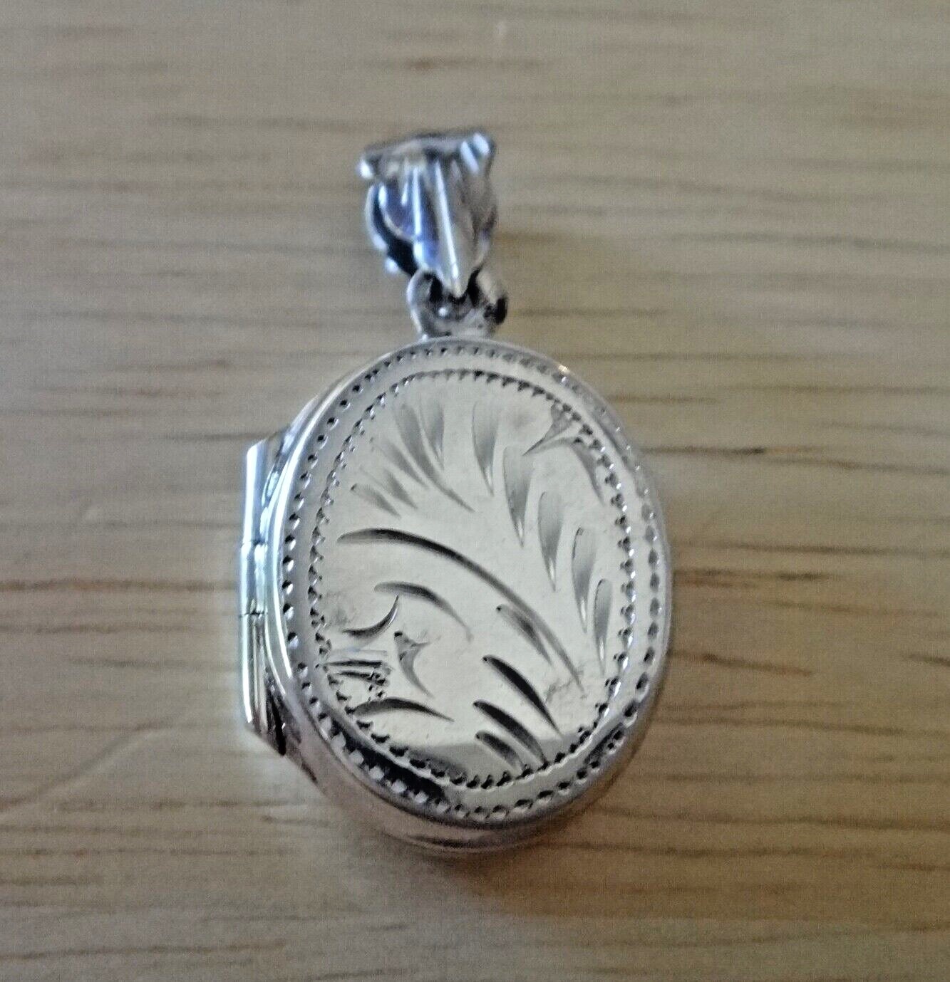 Sterling Silver 29x14x6mm Oval 2 Picture Photo Locket Charm with Bale