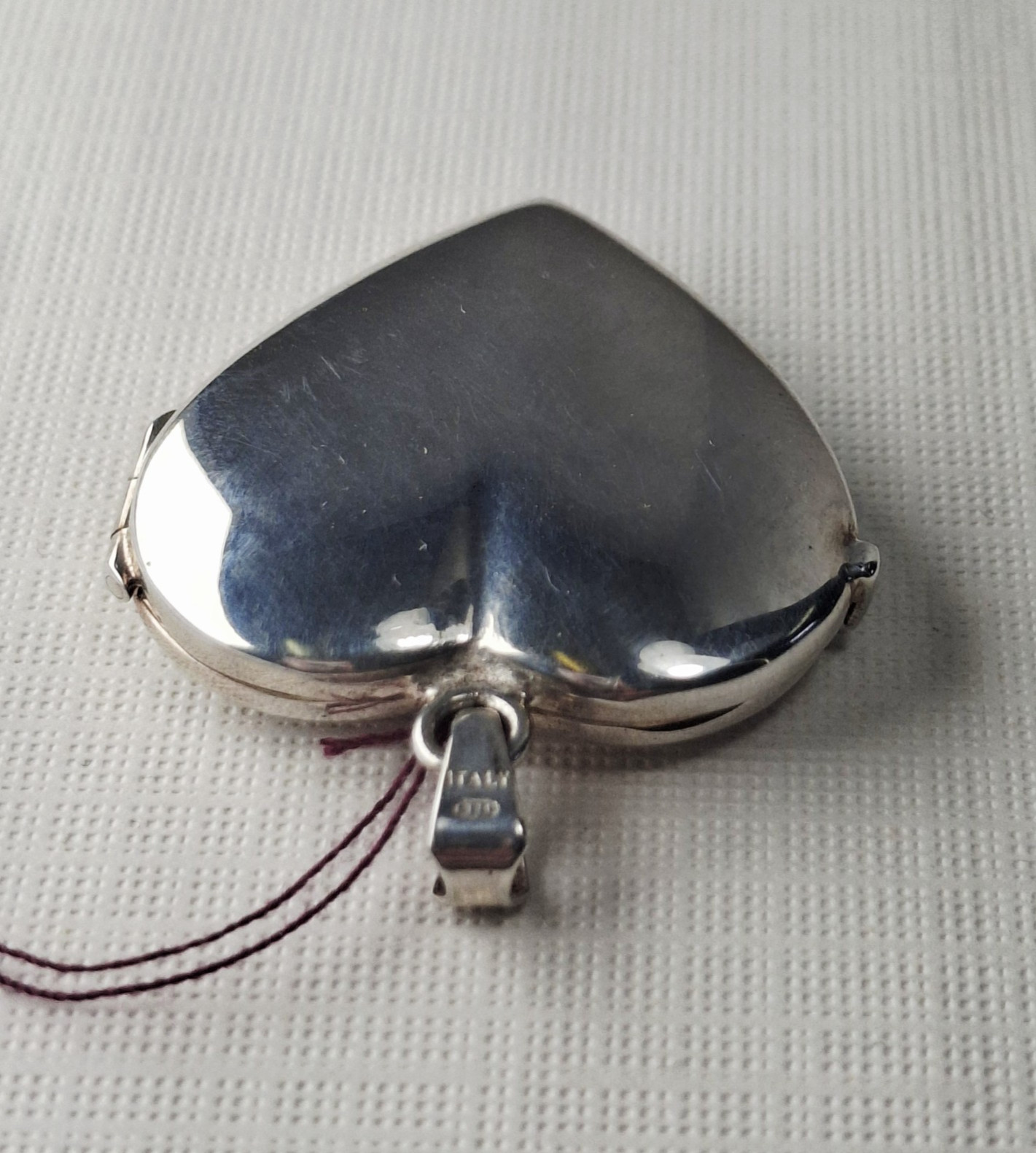 Sterling Silver Heart-Shaped Locket holds 2 photos 1 1/4″ x 1″ Made In Italy