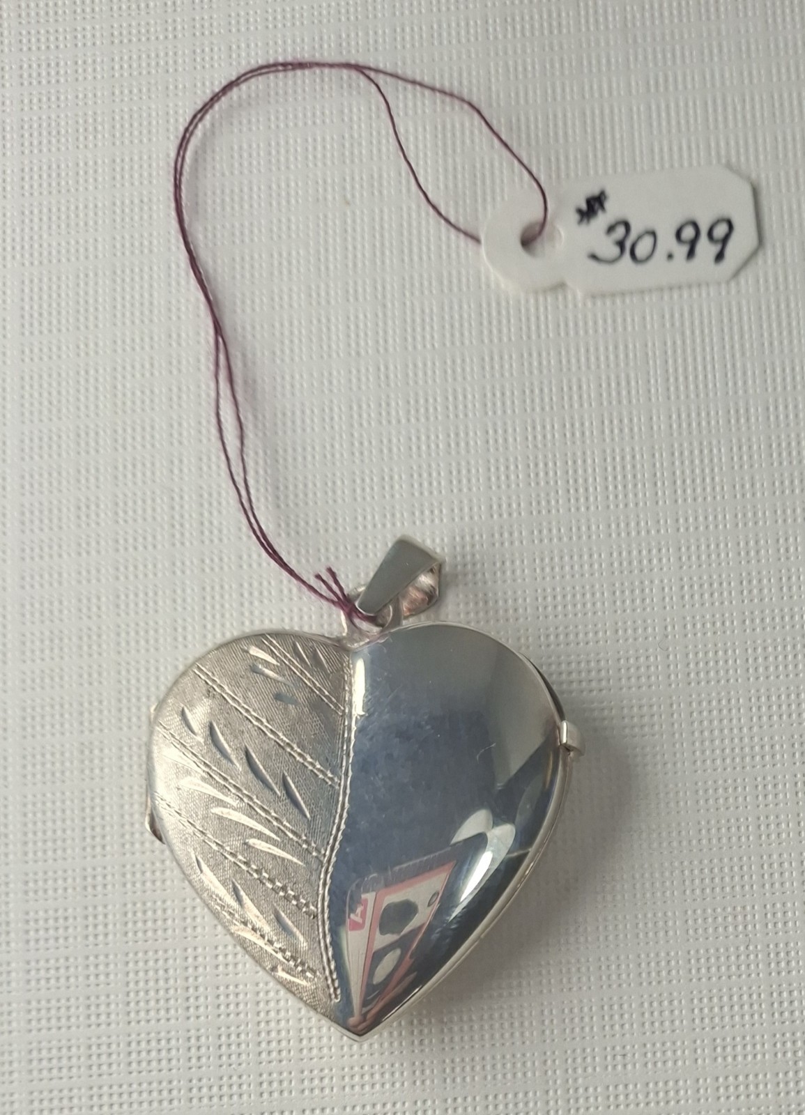 Sterling Silver Heart-Shaped Locket holds 2 photos 1 1/4″ x 1″ Made In Italy