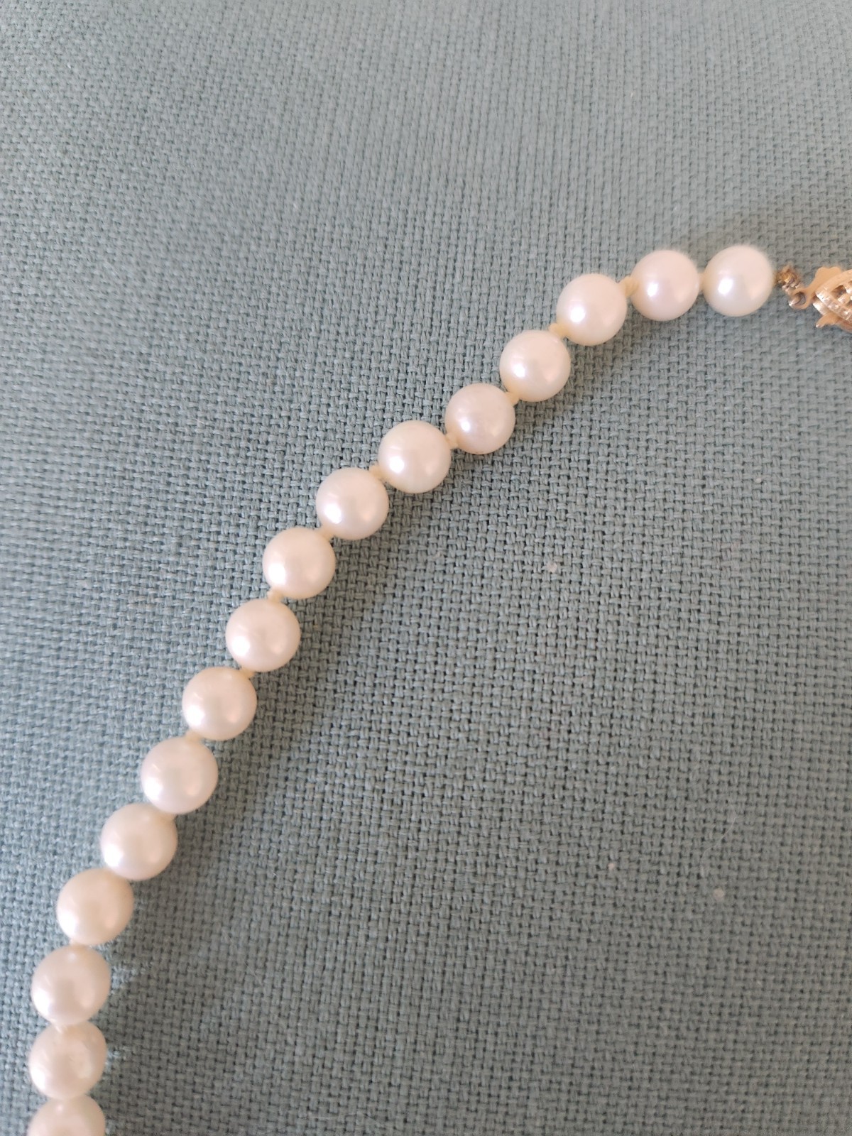 saltwater pearl 16 inch necklace. Beautiful individually tied 7 mm pearls. 14 c